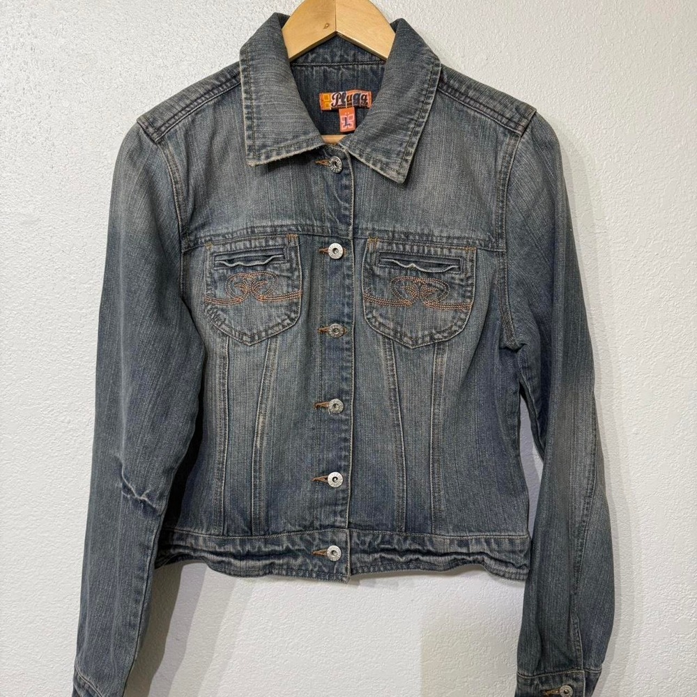 Blue denim jacket with embroidered details